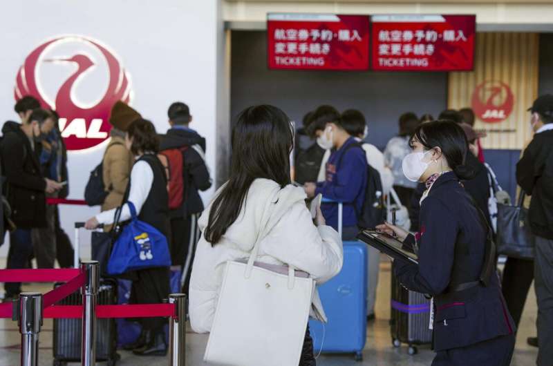 A staff member of Japan Airlines helps customers at Osaka International Airport on the outskirts of Osaka, western Japan, Thursday, Dec. 26, 2024, after the airlines said it was hit by a cyberattack. Credit: Nobuki Ito/Kyodo News via AP Japan Airlines was hit by a cyberattack, delaying flights during the year-end holiday season